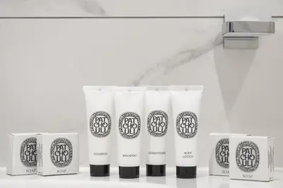 a row of white toilet rolls on a shelf at Green Luxury Apartments in Burgas City