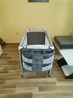 a hospital bed in a room with a bed at Lovely Apartments Amadeus Lux in Sunny Beach