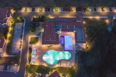 an overhead view of a swimming pool at night at Family Hotel Lalov Egrek in Lozenets