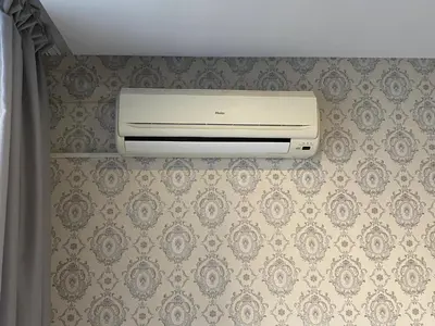 a air conditioner on a wall in a bathroom at PARADISO B 209 Private Sea View Studio NESSEBAR in Nesebar