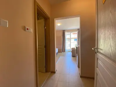 a hallway with a door leading to a room at MESSEMBRIA B504 Studio Sunny Beach in Sunny Beach
