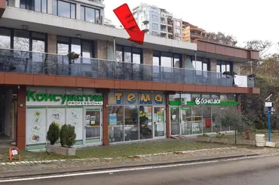 a store on the side of a building at Апартамент Адикт in Sozopol