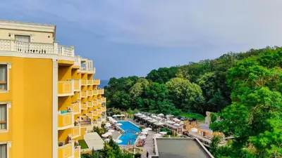 a view of a hotel and a resort with a pool at Marina Sands Bijou Boutique - Amazing views in Obzor