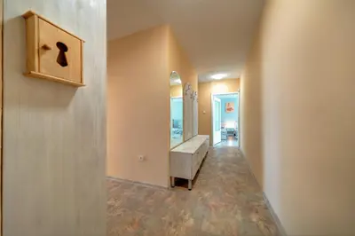 a bathroom with a sink and a mirror at Daisy - 3 Room and kitchen apartment in Lazur in Burgas City