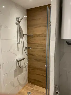 a shower with a glass door in a bathroom at Luxury Private Apartment near Green Life Resort in Sozopol