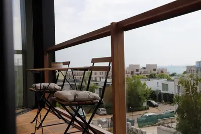 a balcony with a view of a city at Casa Maiolica in Atlantis Atmosphere in Burgas City