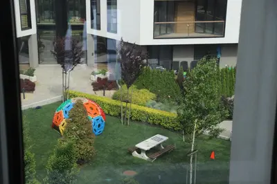 a model of a garden in front of a building at Casa Maiolica in Atlantis Atmosphere in Burgas City