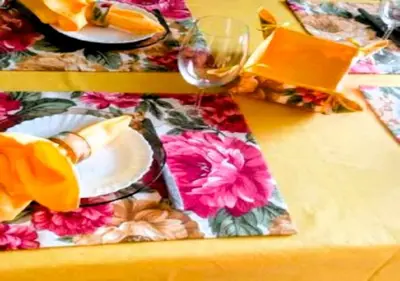 a table with a plate of food and a glass of wine at Уютен апартамент близо до морето IGROEG in Burgas City