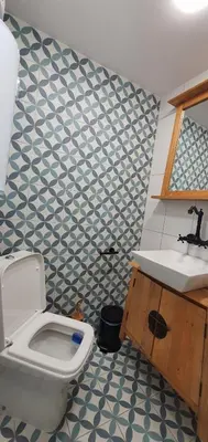 a bathroom with a toilet and a sink at Brand studio in Varna City