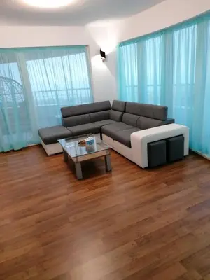 a living room with a couch and a coffee table at Sun Gates Byala in Byala
