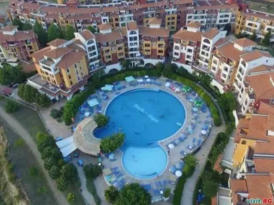 an aerial view of a resort with a large swimming pool at Art studio Marina Cape-private host in Ravda