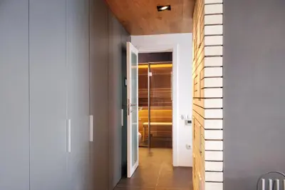 a hallway with a door leading to a bathroom at Beach Villa Varna - cosiness 4 meters from the sea in Varna City