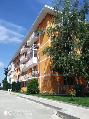 a large apartment building on the side of a street at Gerber Residence 2 in Sunny Beach