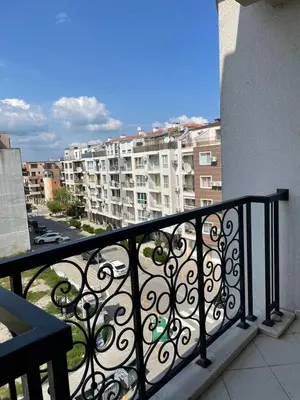 a balcony with a view of a city at Aivazovski park - Pomorie SP apartments in Pomorie