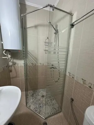 a shower with a glass door in a bathroom at Studio B28 Sunny Island Chernomorez in Chernomorets