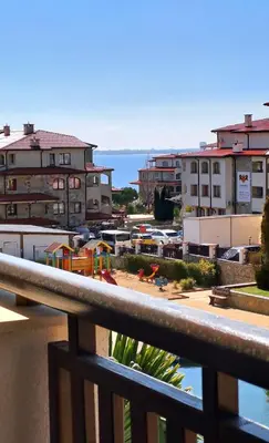 a view of a city from a balcony at Александър Студио in Sveti Vlas