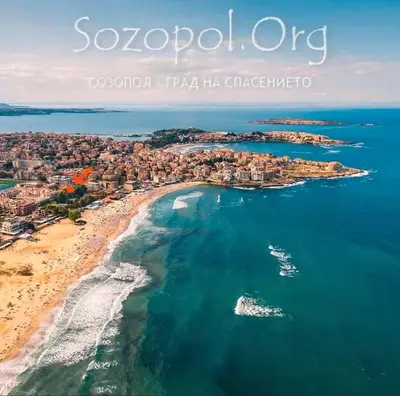 an aerial view of a beach with boats in the water at Sozopol Apartcomplex Onegin 2,free parking in Sozopol