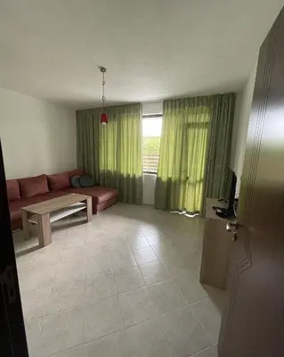 a living room with a couch and a table at Studio 8 Arapya in Tsarevo