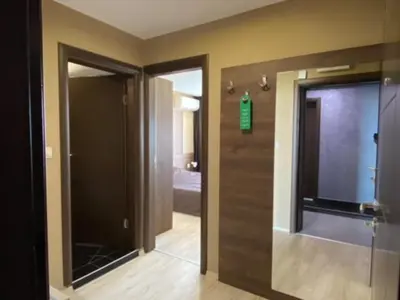 a bathroom with a glass door and a mirror at PARADISO 'B' 605 Private Apartment Nessebar in Nesebar
