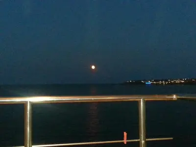 a view of the ocean at night with the moon at Sozopol Bulgaria VIP zona in Sozopol