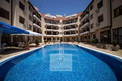 a swimming pool in the middle of a building at BohoTide by the Sea in Bliznatsi