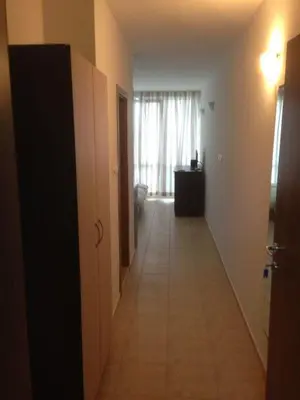 a hallway of a room with a long hallwayngthngthngthngthngthngthngth at Vilmar Studio in Pomorie