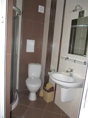 a bathroom with a toilet and a sink at Rayski zalez in Pomorie