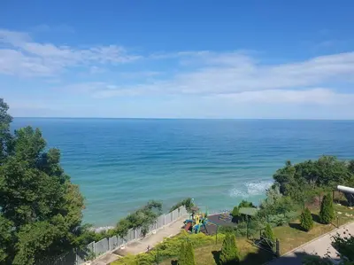 a view of the ocean with a playground at Studio Silver Terace with Sea View for 4 person in Byala