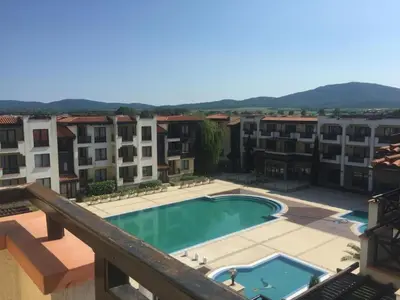 a view from the balcony of a apartment with a swimming pool at Luxory Apartament on the Seaside, Gradina beach, St Nicholas Complex in Chernomorets
