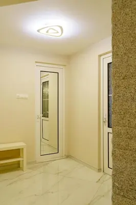 an empty room with a door and a window at Centrally Located Apartment in Varna in Varna City