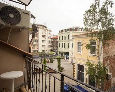 a balcony with a speaker on the side of a building at ALEKS Top Center in Burgas City