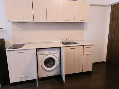 a kitchen with a washing machine and a sink at Sunny Dream Apartments Sunny Beach Bulgarien Sonnenstrand in Sunny Beach