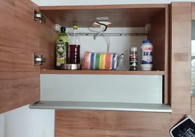 a cupboard with a laptop on top of it at Ideal three bed apartment for families closed to the Beach in Sunny Beach