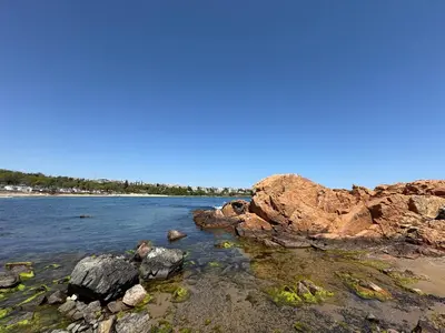 a view of a beach with rocks in the water at Studio Maré Chernomorets in Chernomorets