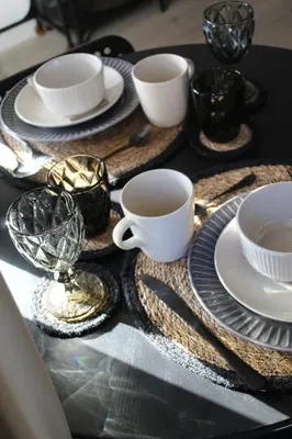 a table with plates and cups on a table at A&K Guest Studio in Varna City
