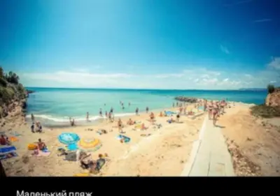 a large group of people on a beach at 2-комнатные апартаменты у моря 10 бассейнов Crown Fort Noks in Sveti Vlas
