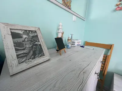 a picture of a man on a counter in a room at Bright 1BD Apartment with Nice Terrace by Flat Mаnаger in Burgas City