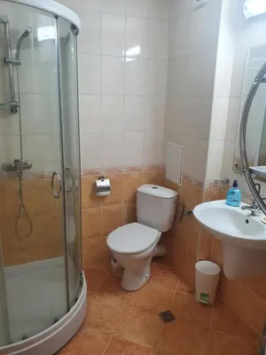 a bathroom with a toilet and a sink and a shower at Paradise Dreams - Bulharske More - Sveti Vlas in Sveti Vlas