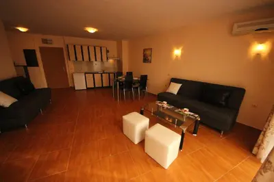 a living room with a couch and a table at Paradise Dreams - Bulharske More - Sveti Vlas in Sveti Vlas