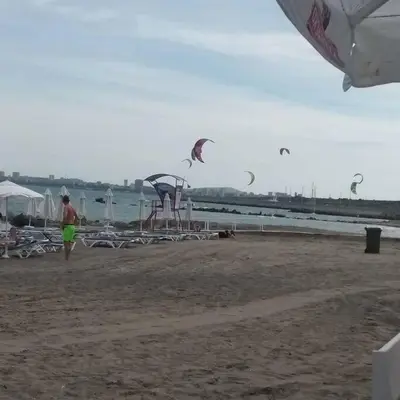 a group of kites being flown on the beach at Studio in the center of Sarafovo in Burgas City