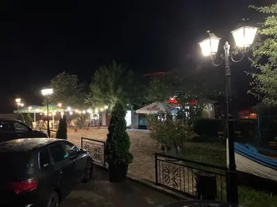 a parking lot at night with a street light at Апартамент Нели in Ravadinovo