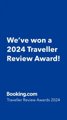 a blue sign that says weve won a traveler review award at Atlantis Resort D111 апартамент in Burgas City