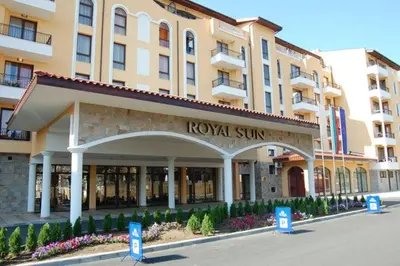 a hotel building with a royal sign in front of it at Royal Sun Premium Apartment in Sunny Beach