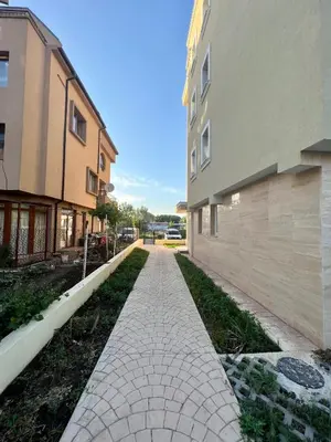 a walkway between two buildings next to a building at Modern Spacious 1BD Apartment for two in Nesebar by Flat Mаnаger in Nesebar