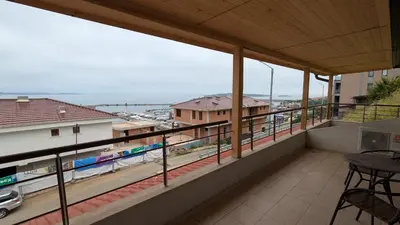 a balcony with a view of a train at Romantic Getaway 1-BD Apartment with Sea View by Flat Mаnаger in Sozopol