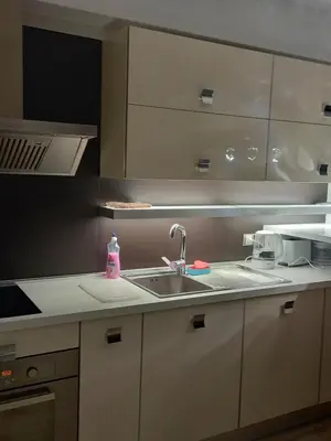a kitchen counter with a sink and a sink at Perla 1 apartments in Ravda