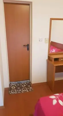 a door leading into a room with a mirror at Rainbow 1 in Sunny Beach