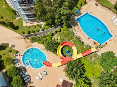 an overhead view of a water park with a pool at Imperial Fort Club in Sveti Vlas