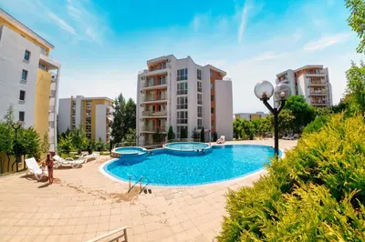 a swimming pool in the middle of a building at Imperial Fort Club in Sveti Vlas