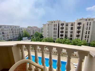 a balcony with a view of some buildings at Cascadas Family Resort - Private apartment - BSR in Sunny Beach